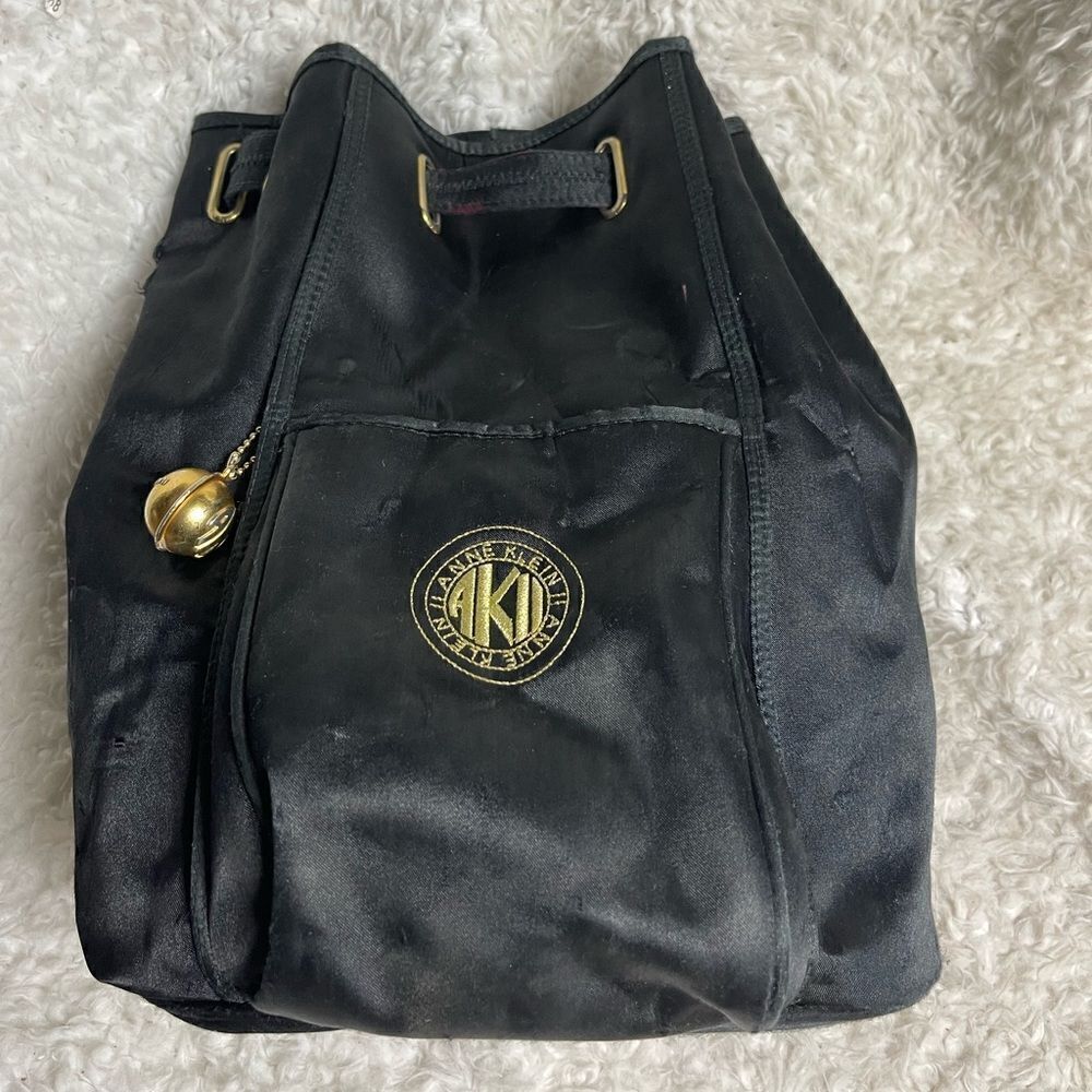 ANN KLEIN II Black Satin medium sling back brass accents .